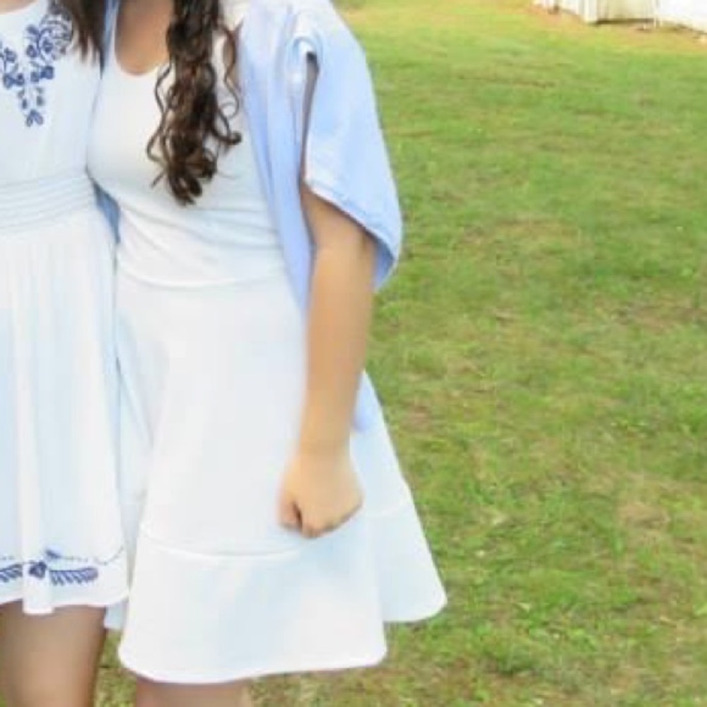 White dress perfect for graduation.